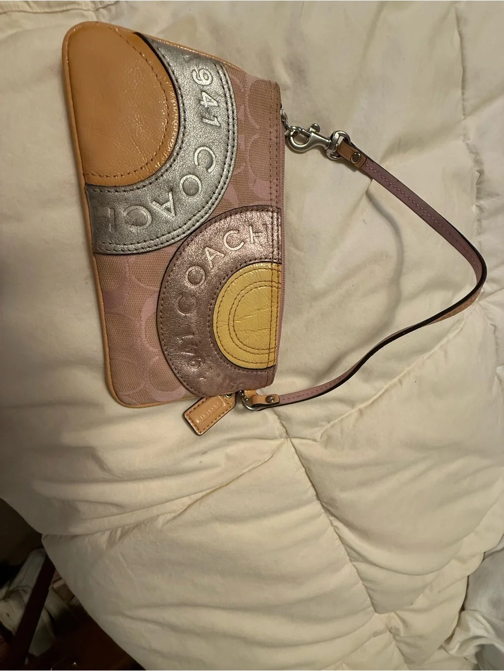 Coach Pink Signature Wristlet with Metallic Silver and Gold Accents